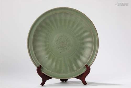 A celadon plate. China, late Yuan dynasty/ early Ming dynast...