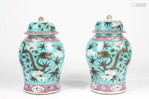 A pair of Famille Rose vases with covers. China, half of 19t...