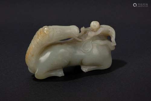 A celadon and russet jade carving. China, late 19th c.