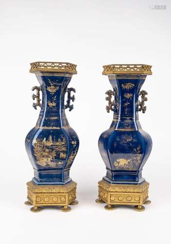 A pair of two-handled blue vases. China, late 19th c.