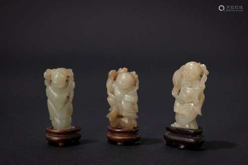 Three jade figures carvin. China, 19th c.