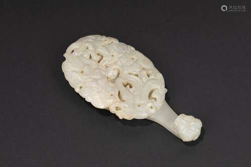 A white jade buckle. China, 19th c.