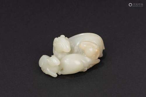 A white jade group of three rams. China, 19th c.