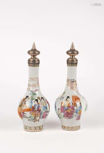 A pair of Famille Rose bottle vases. China, 20th c.