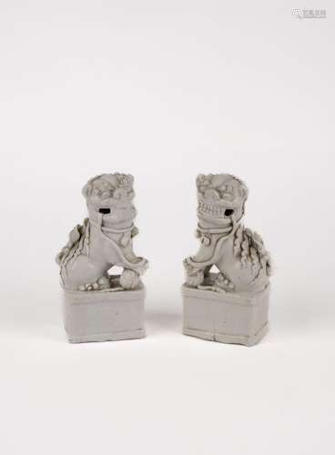 A pair of Blanc de Chine pho dogs. China, early 20th c.