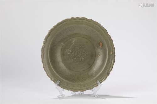 A celadon plate. China, late Yuan dynasty/ early Ming dynast...