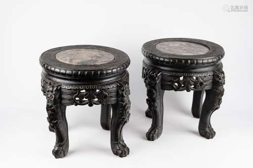 A pair of carved wood low tables. China, late 19th c.