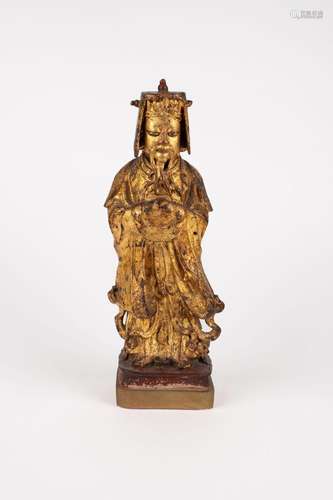 An antique gilt bronze figure