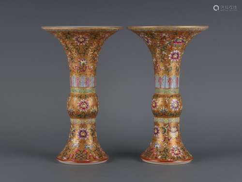 A pair of Jindi famille rose goblets with entangling branche...