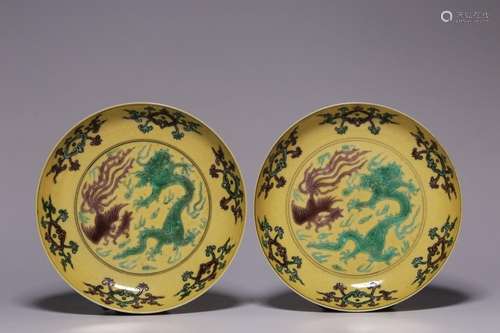 Yellow glaze dragon flying phoenix dance plate