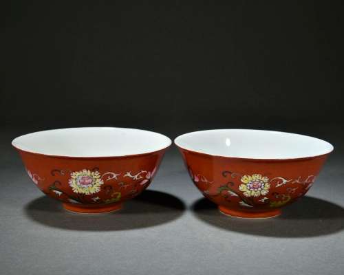 A pair of red-glazed famille rose bowls with twining lotuses