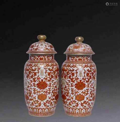 A pair of alum red lantern general bottles