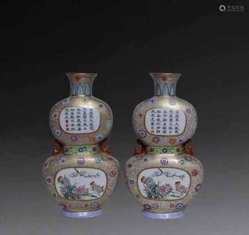 Pair of enamel colored poetry wall vases