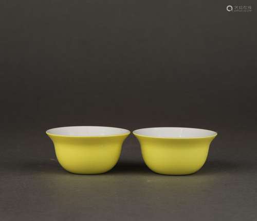 A pair of Chinese yellow glazed porcelain cups, Chenghua