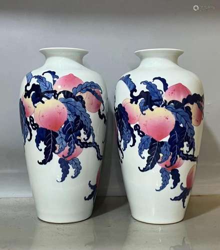 Wang Bu, a pair of blue and white glazed peach patterned por...