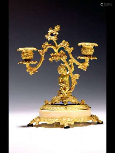 Candlestick with bacchante, France, early 20thcentury