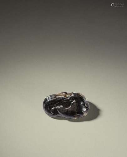 A BLACK AND WHITE JADE CARVING OF A MANDARIN DUCK Song/Yuan ...