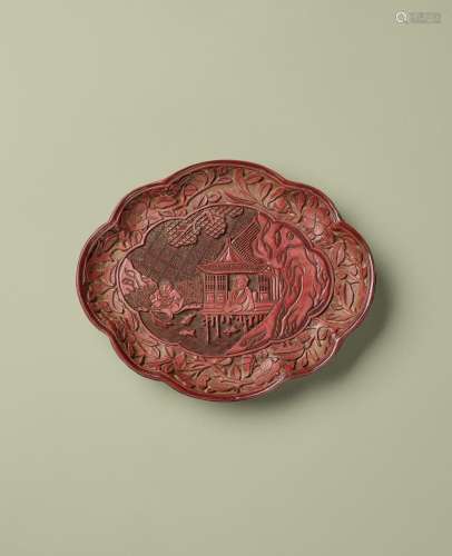 A CARVED CINNABAR LACQUER LOBED DISH Mid Ming dynasty, Cheng...