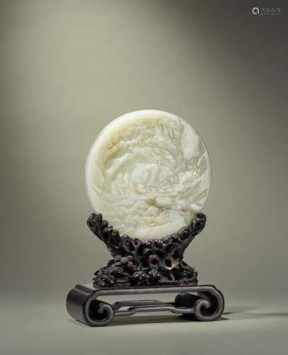 A WHITE JADE DOUBLE-SIDED CIRCULAR TABLE SCREEN 18th century...