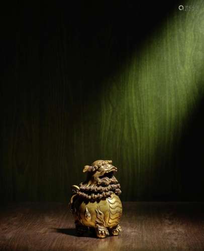 A GILT-BRONZE 'LION' INCENSE BURNER Ming/Qing Dynast...