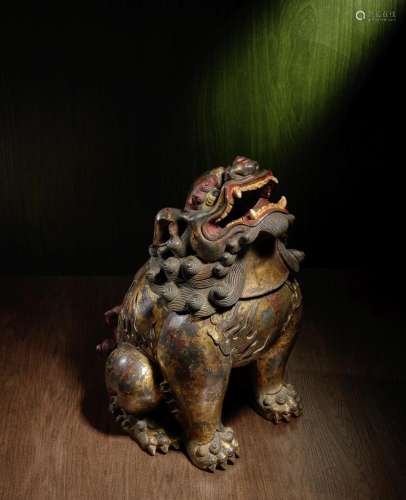 A LARGE PAINTED BRONZE 'MYTHICAL BEAST' INCENSE BURN...