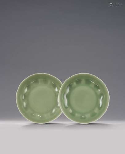 AN EXQUISITE PAIR OF CELADON-GLAZED LOBED DISHES Qianlong se...
