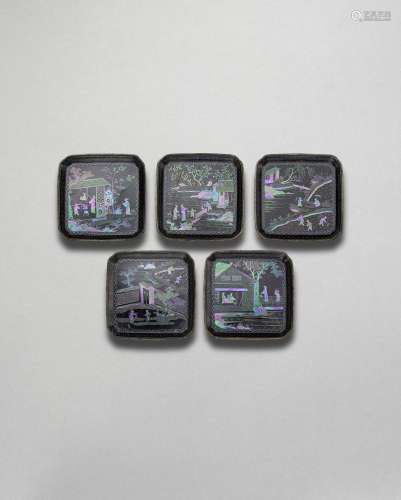 A SET OF FIVE SMALL MOTHER-OF-PEARL INLAID BLACK LACQUER TRA...