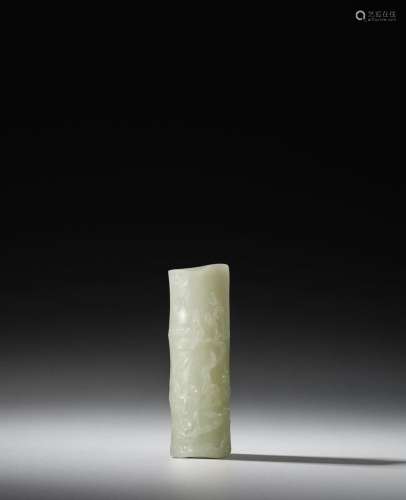 A WHITE JADE 'PRUNUS AND BAMBOO' WRIST REST 18th cen...