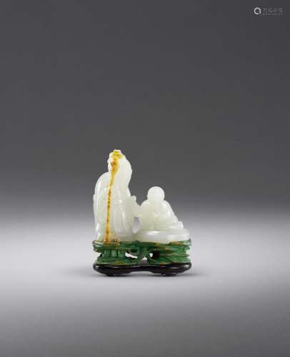 AN EXQUISITE WHITE JADE 'SHOULAO AND BOY' CARVING Qi...
