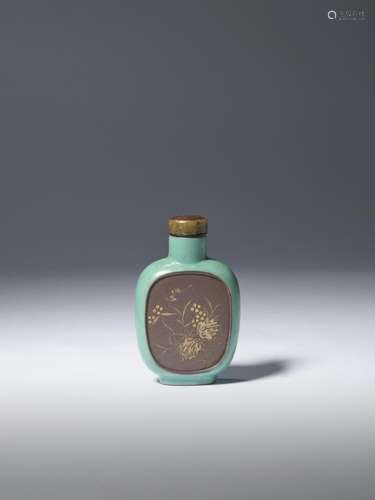 A TURQUOISE-GROUND SLIP-DECORATED YIXING 'LANDSCAPE'...