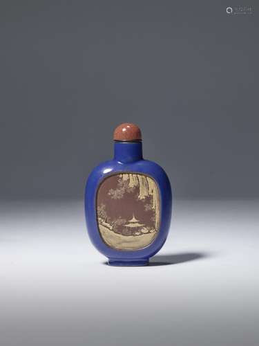 A BLUE-GROUND SLIP-DECORATED YIXING 'LANDSCAPE' SNUF...