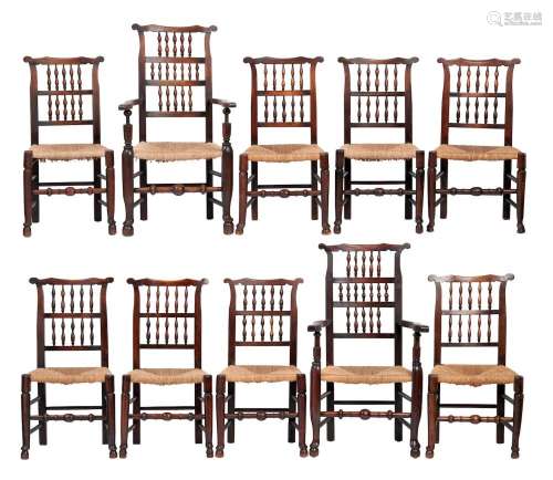 A MATCHED SET OF TEN BEECH AND ELM SPINDLE BACK DINING CHAIR...