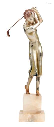 AN ART DECO COLD PAINTED BRONZE OF A LADY GOLFER BY JOSEF LO...