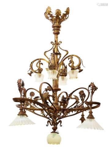 A 'CHICOREE' BRONZE AND GLASS CHANDELIER BY LOUIS MA...
