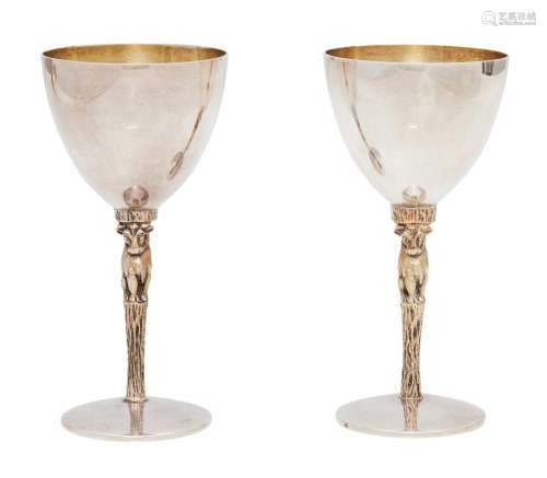 A PAIR OF ELIZABETH II SILVER AND SILVER-GILT GOBLETS BY STU...