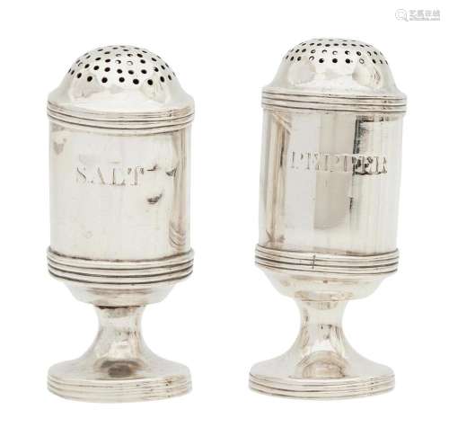 A PAIR OF ANGLO INDIAN SILVER CASTERS
