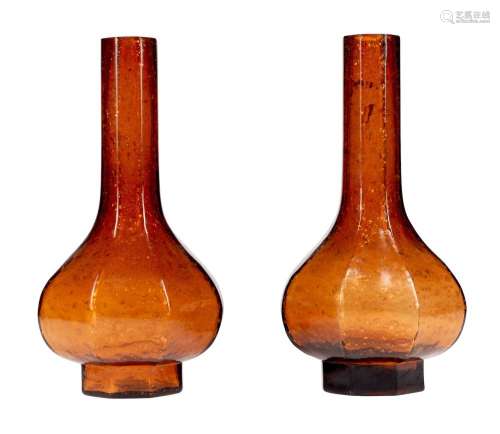 A PAIR OF GOLD FLECKED AMBER MOULDED BEIJING GLASS BOTTLES