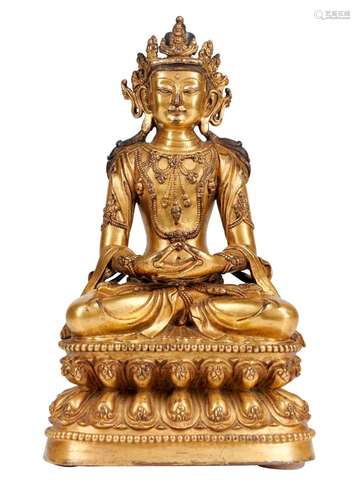 A CHINESE GILT-BRONZE FIGURE OF AMITAYUS