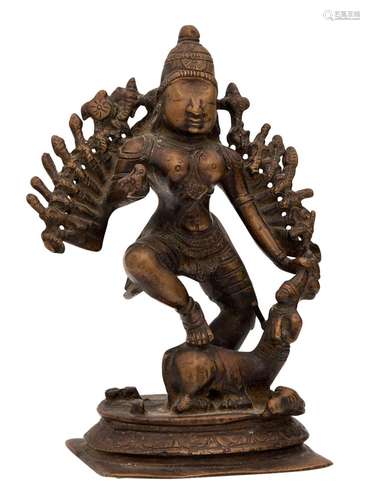 AN INDIAN BRONZE FIGURE OF MAHISHASURA MARDINI