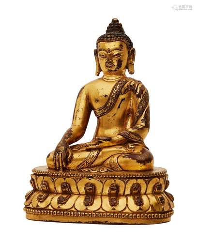 A TIBETAN GILT-BRONZE FIGURE OF SHAKYAMUNI BUDDHA