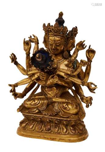 A TIBETAN FIGURE OF A DEITY IN YAB YUM