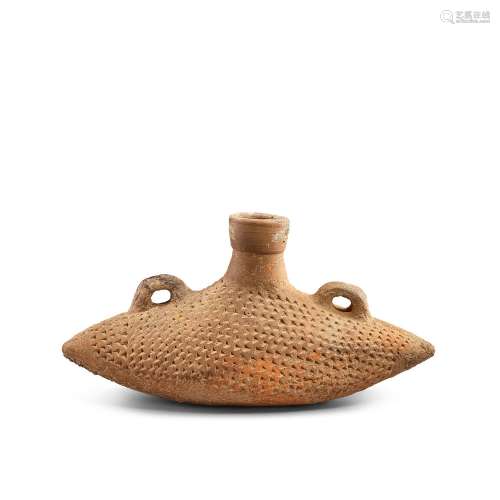 A red pottery plain boat-form flask with pricked designs, Ya...