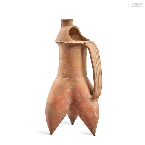 A large pottery tripod ewer, Bronze Age, ealry 2nd Millenium...