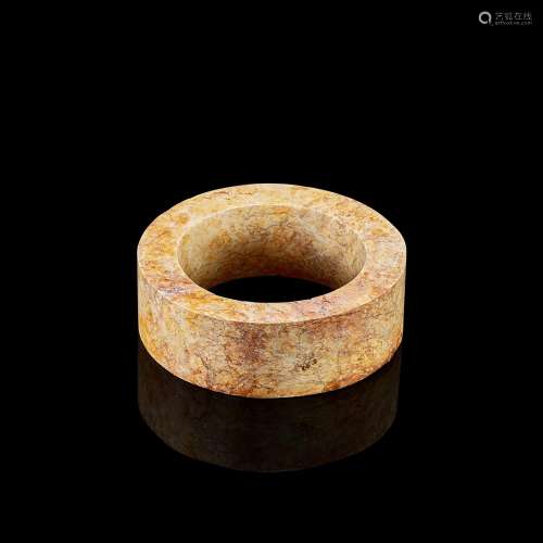 An archaic calcified jade bangle, Neolithic period, possibly...