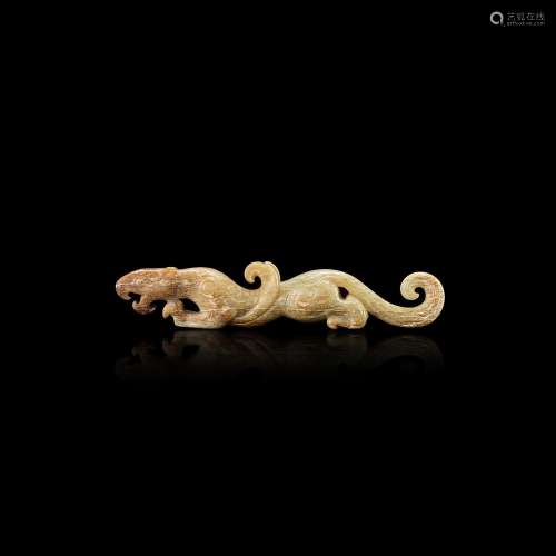 A calcified celadon and russet jade winged tiger, Eastern Ha...