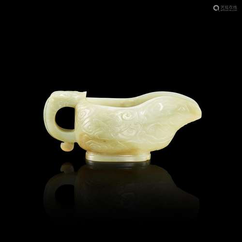 A celadon jade archaistic 'dragon' vessel, yi, 17th ...