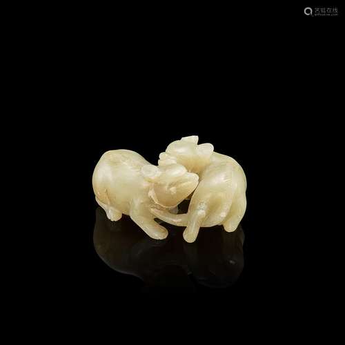 A celadon jade 'badgers' group, Qing dynasty, 19th c...