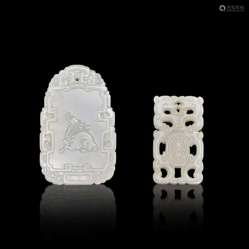 Two white jade pandents, Qing dynasty, 18th century 清十八世...