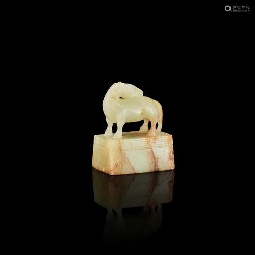 A celadon and russet jade 'horse' paperweight, Qing ...