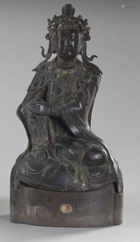 Chine, XIXe siècle
Statue de Guanyin en bronze assise e
